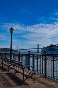 View of bridge against cloudy sky