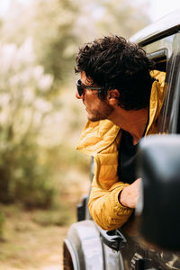 Woman sitting in car