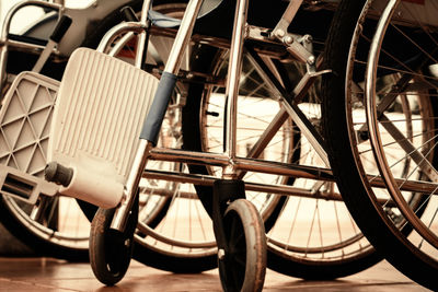 High angle view of bicycle parked against wall