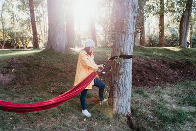 Side view of man in forest