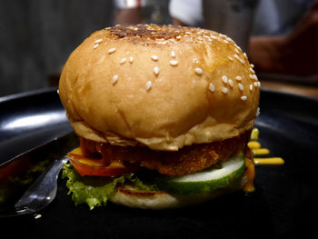 Close-up of burger on table