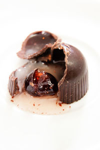 Close-up of ice cream over white background