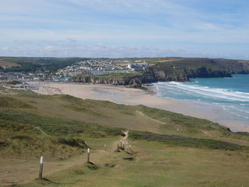 Scenic view of beach against sky