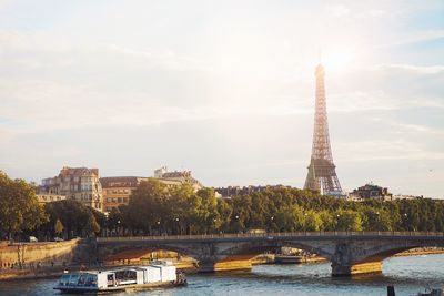 Eiffel tower against sky in city