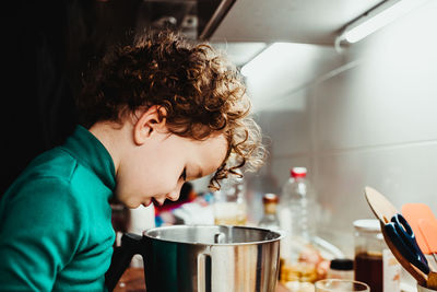 Portrait of man preparing food at home