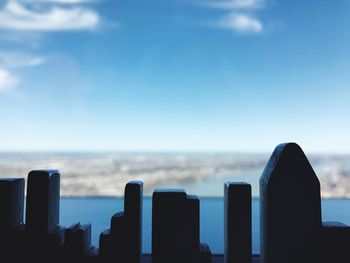 Close-up of cityscape against sky