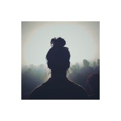 Silhouette woman standing against clear sky