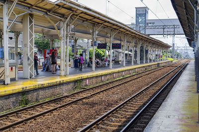 Railroad station platform in city