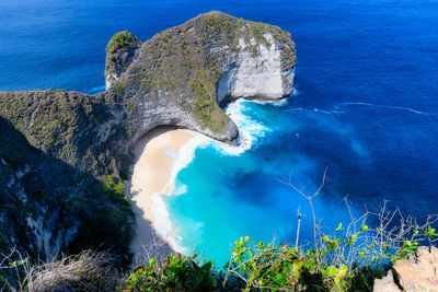 High angle view of rock formation in sea