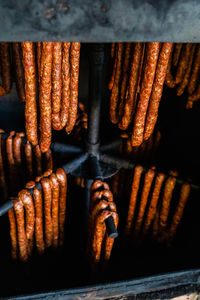 High angle view of meat on barbecue grill