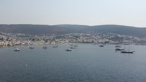 Boats moored in sea