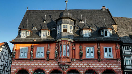 Low angle view of old building against sky