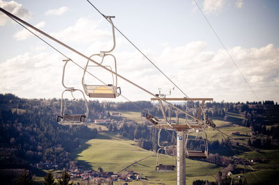 Overhead cable car with landscape in background