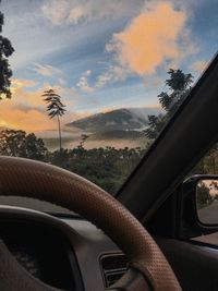 Scenic view of sky seen through car windshield