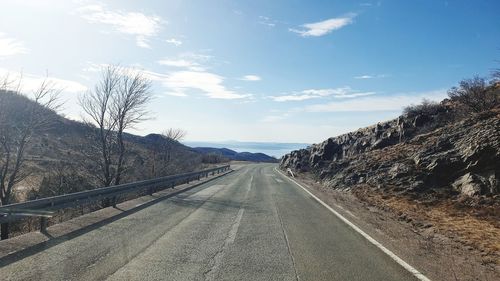 Surface level of road against sky