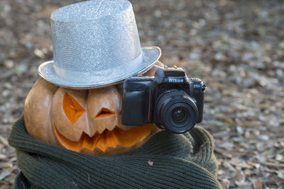 Close-up of camera photographing