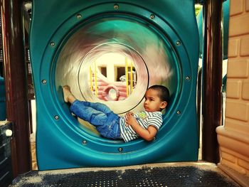 Portrait of boy playing in playground