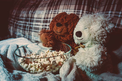 High angle view of stuffed toy on bed