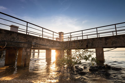 Bridge over river against sky