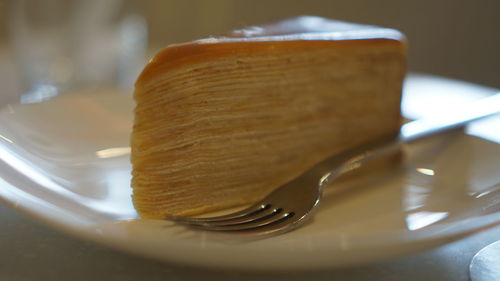 Close-up of cake served in plate on table