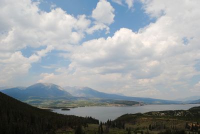 Scenic view of landscape and mountains against sky