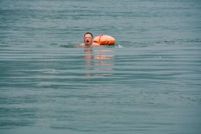 Man swimming in jialing river