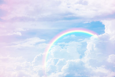 Low angle view of rainbow in sky