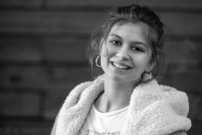 Portrait of smiling young woman