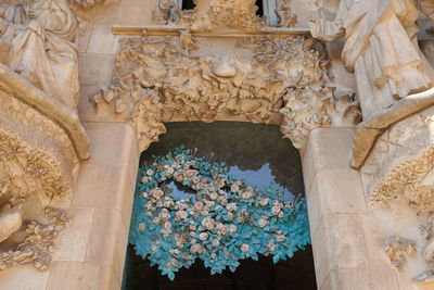 The statues on the outer facade of the basilica of the sagrada familia, barcelona, spain.