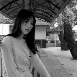 Portrait of woman at railroad station