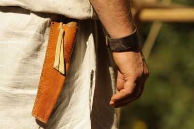 Close-up of man working on wood