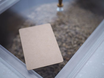 High angle view of paper on table