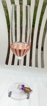 Close-up of wine glasses on table