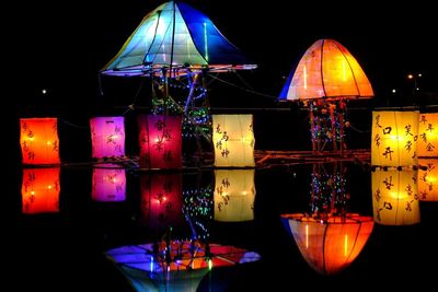 Illuminated lantern at night