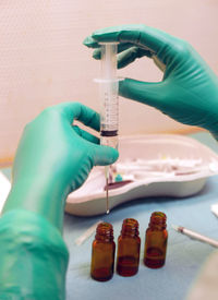 Cropped image of doctor with syringe