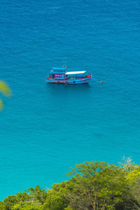 High angle view of ship sailing in sea