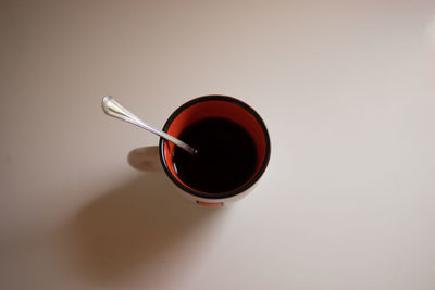 High angle view of coffee cup on table