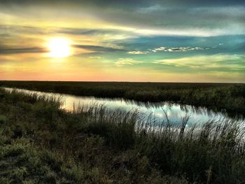 Scenic view of sunset over sea