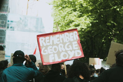 Rear view of people on the road