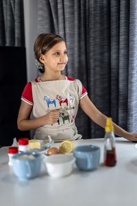 Portrait of a woman having breakfast at home