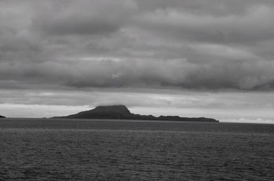 Scenic view of seascape against cloudy sky