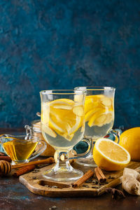 Yellow fruits in glass on table