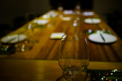 Close-up of wine bottles on table in restaurant