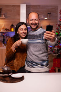 Man and woman looking at camera