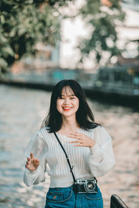 Portrait of a smiling young woman