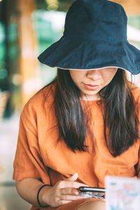 Close-up of woman looking at camera