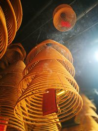 Low angle view of illuminated lantern hanging in temple