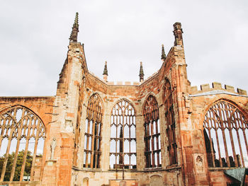 Low angle view of historical building against sky