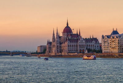 Colorful sunset on hungarian parliament building in budapest, hungary