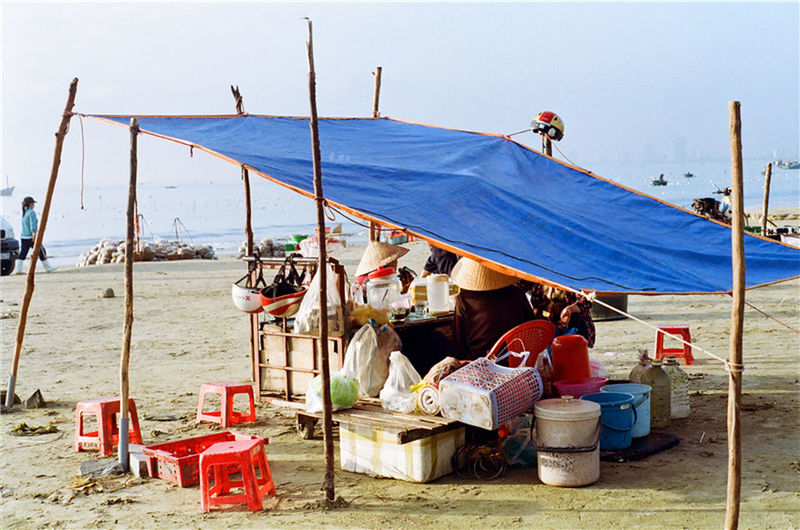 beach, sand, sea, shore, sky, horizon over water, water, beach umbrella, deck chair, vacations, parasol, moored, sunshade, absence, sunlight, nautical vessel, clear sky, day, incidental people, boat